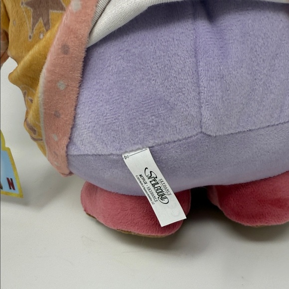 Oracle Sunny from “Spellbound”. Purple Plush Toy with Yellow and Pink Outfit - Picture 6 of 8